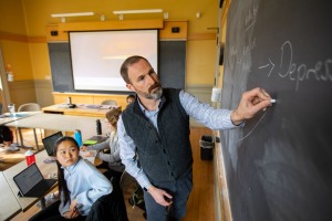 Faculty at board